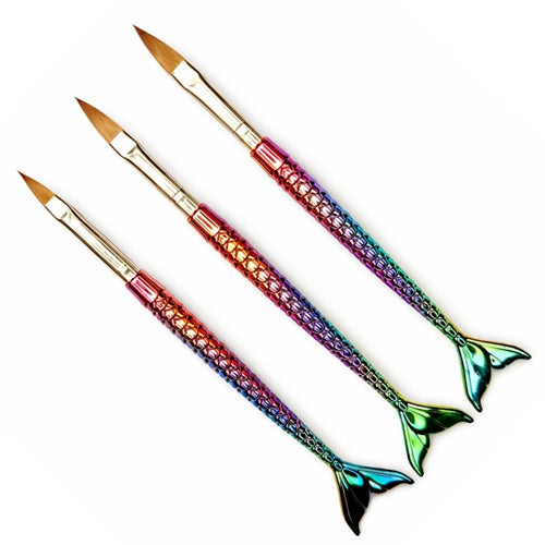 Three acrylic nail brushes with textured rainbow mermaid tail handles, gold-tone ferrules and pointed brown bristles.