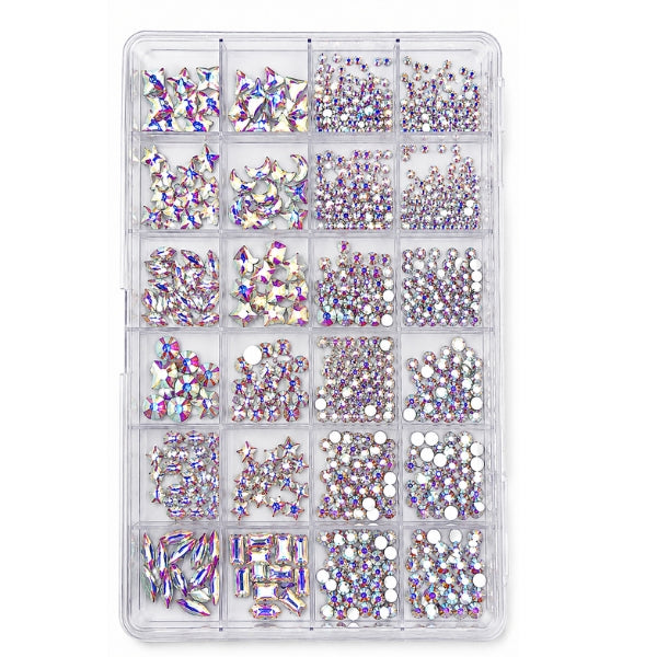 Nail art rhinestones in a 24-compartment box with assorted AB crystal shapes and mixed sizes for nail decoration.